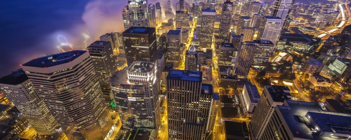 Aerial view of Seattle city lights at night highlighting vibrant downtown nightlife district
